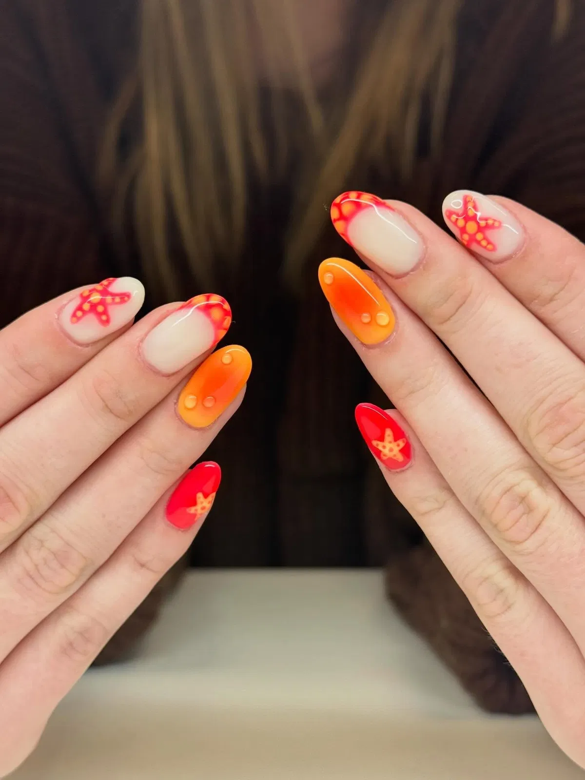 Orange-red set with starfish and raised dots