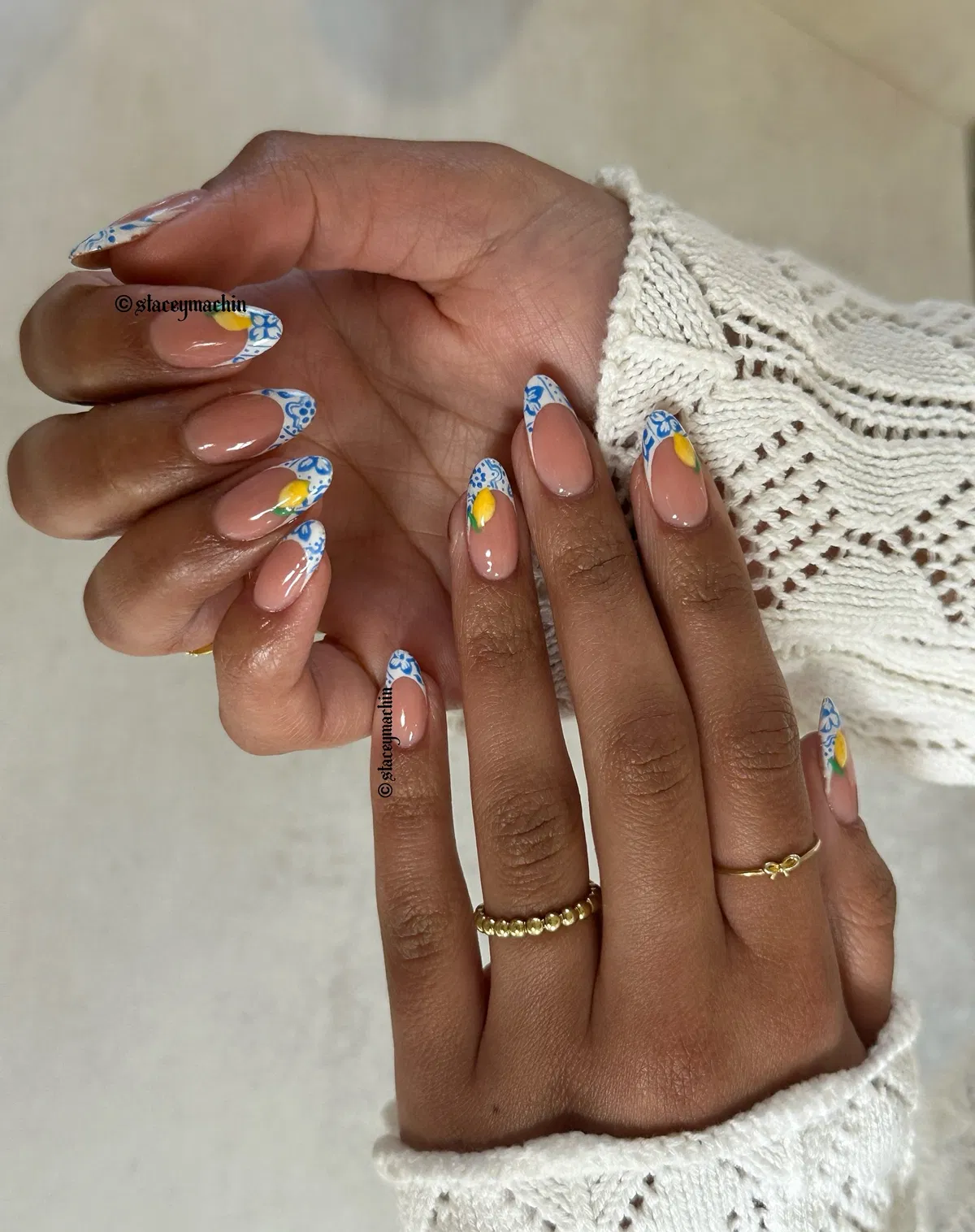 Blue patterned French tips with lemon accents